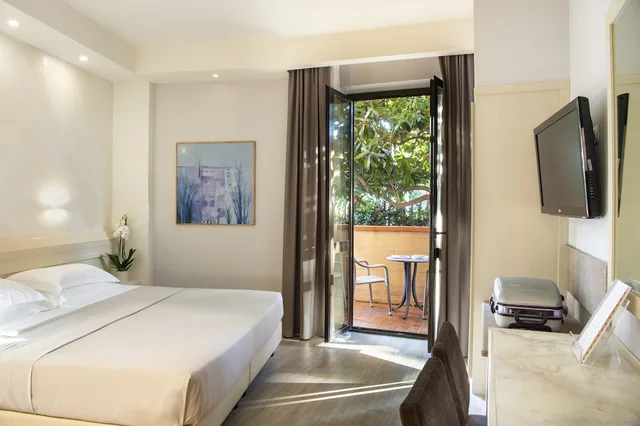 غرفة ديلوكس بسرير كينج، Hotel Grifone Firenze 1/3
