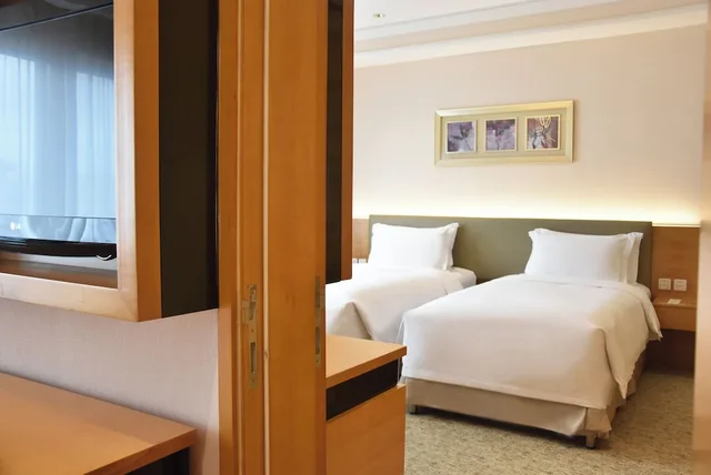 غرفة متصلة عائلية بسرير كينج وسريرين منفصلين، Millennium Hotel Chengdu 1/5
