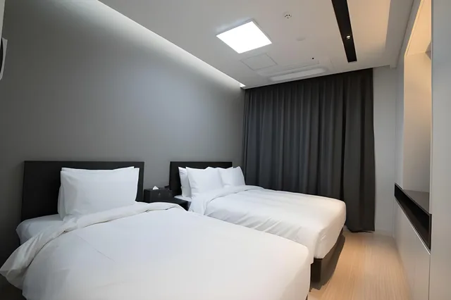 غرفة ديلوكس بسريرين منفصلين بإطلالة على البحر، Sunrise Hotel Sokcho 2/2