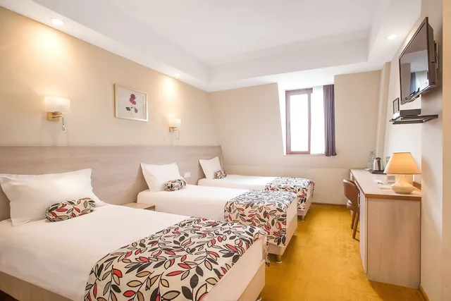 غرفة اقتصادية ثلاثية بثلاثة أسرّة، Urban Boutique Hotel 1/3