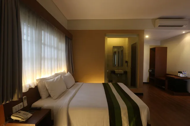 غرفة ديلوكس بسرير كينج، Grand Whiz Hotel Nusa Dua 8/8
