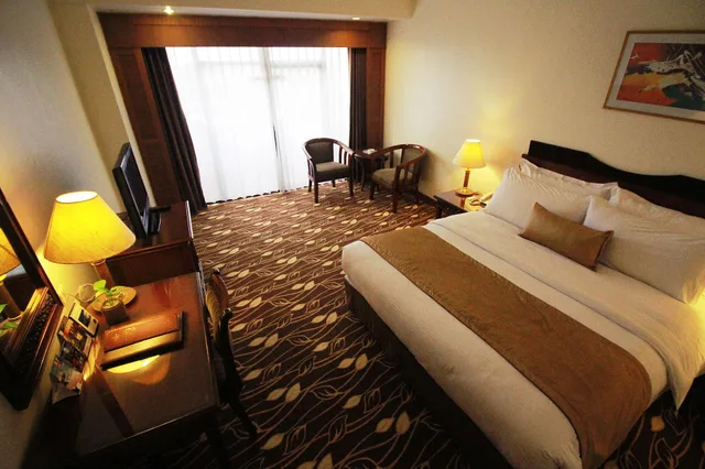 غرفة ديلوكس ثلاثية بسرير كوين وسرير فردي، Planet Holiday Hotel And Residence 2/2