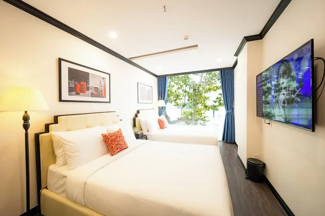 غرفة عائلية رباعية بسريرين مزدوجين بإطلالة على المدينة، The Passion Suite Hotel 1/10