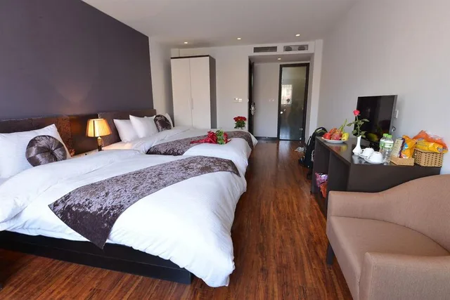 غرفة عائلية بإطلالة على المدينة، Hanoi La Palm Premier Hotel & Spa 1/5