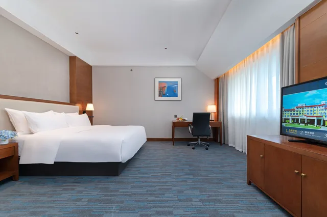غرفة تنفيذية بسرير كوين، Yihohotel Xiang an Xiamen 1/4