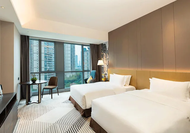 غرفة ديلوكس بسريرين منفصلين، Poly Yueya Hotel 1/2