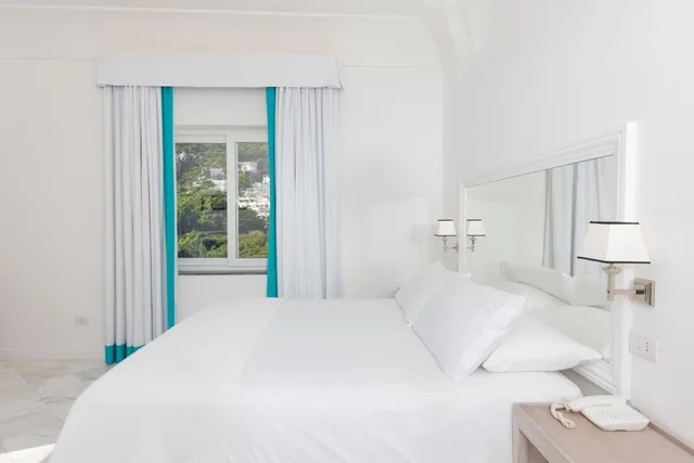 غرفة بسرير مزدوج بإطلالة على البحر، Hotel Mamela 3/10