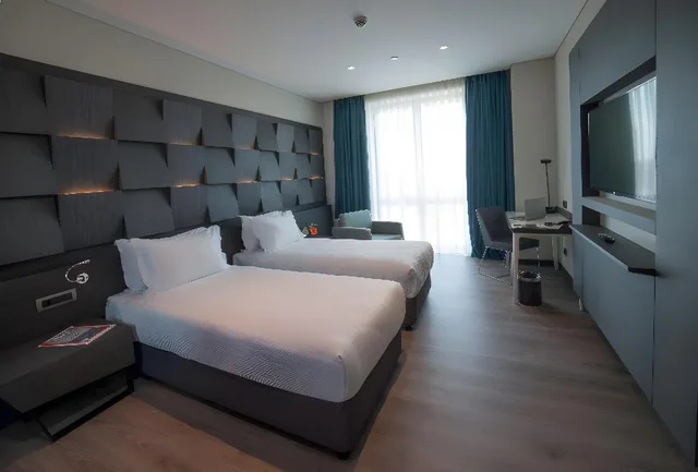 غرفة قياسية ثلاثية بسرير كينج وسريرين منفصلين، Wish More Hotel 1/1