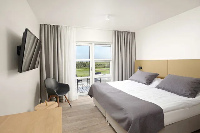 غرفة قياسية بسريرين منفصلين بحمام خاص، ICELANDAIR HOTEL HAMAR 1/5