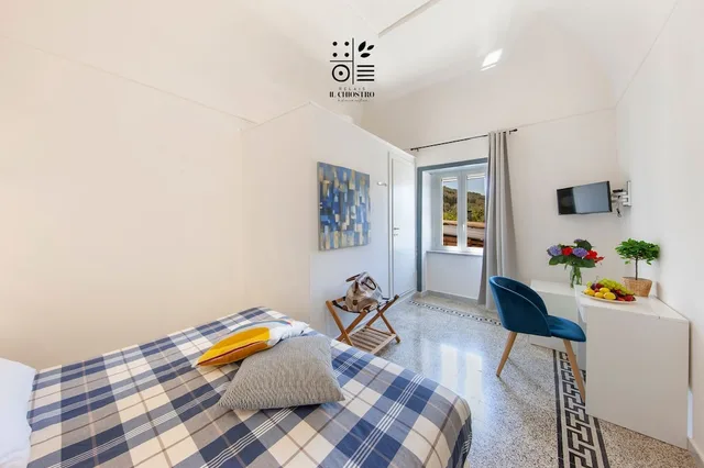 غرفة ديلوكس بفراش فوتون وسرير كوين مع أريكة، Relais Il Chiostro 4/5