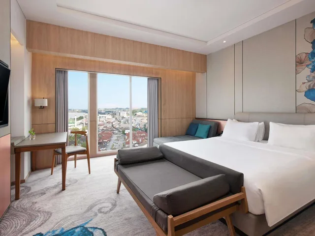 غرفة ديلوكس بسرير كينج وسرير كوين، Mercure Samarinda 1/6