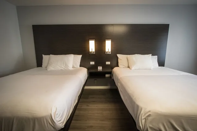 غرفة بسريرين كوين بمطبخ صغير، Envi Boutique Hotel 4/10