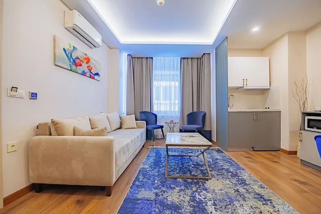 شقة رئاسية بسرير كوين مع أريكة، Comfort Beige Hotel 4/8