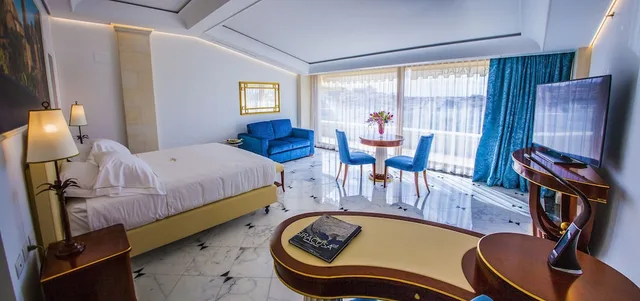 جناح جونيور بسرير كينج بإطلالة على البحر بشرفة، Ortea Palace Hotel, Sicily, Autograph Collection 1/8