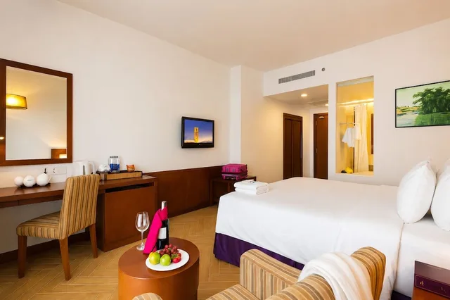 غرفة ديلوكس بسرير كينج بإطلالة جزئية على البحر، TTC Hotel - Michelia 9/10