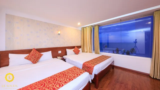 غرفة ديلوكس رباعية بإطلالة على البحر، Le Solei Hotel Nha Trang 1/2