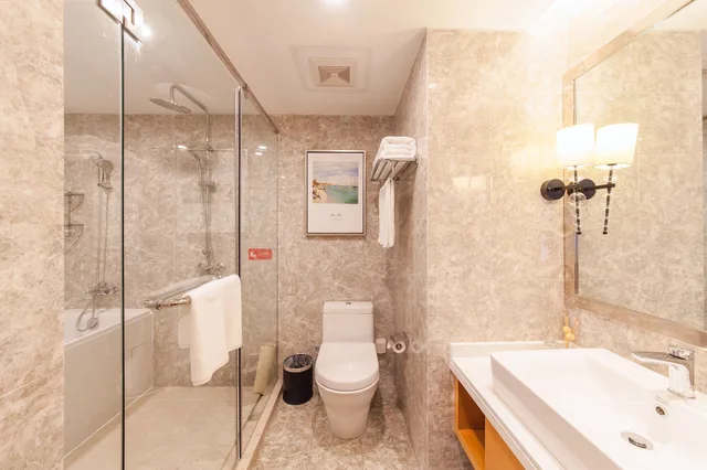 غرفة ديلوكس بسريرين منفصلين، Suisse Place Hotel Residence Cmctaizhou 1/1