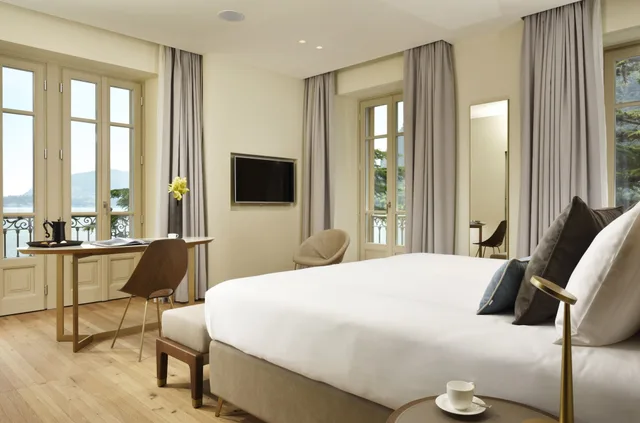 جناح جونيور بسرير كينج بإطلالة على البحيرة مع أريكة، Grand Hotel Victoria Concept And Spa 2/7