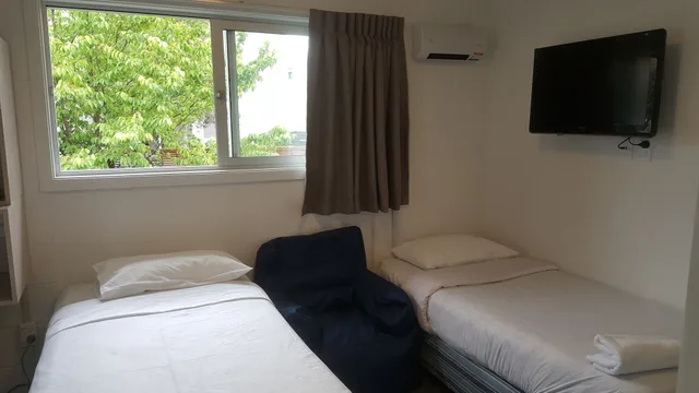 غرفة عائلية بسرير مزدوج وسريرين منفصلين بغرفة نوم واحدة، Siesta Motel 3/10