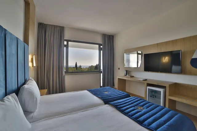 غرفة قياسية بسريرين منفصلين بإطلالة على المسبح، Nashira City Resort Hotel 6/8