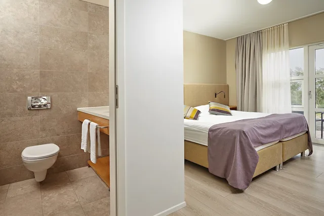 غرفة ديلوكس بسرير كوين بحمام خاص مع أريكة، ICELANDAIR HOTEL HAMAR 7/8