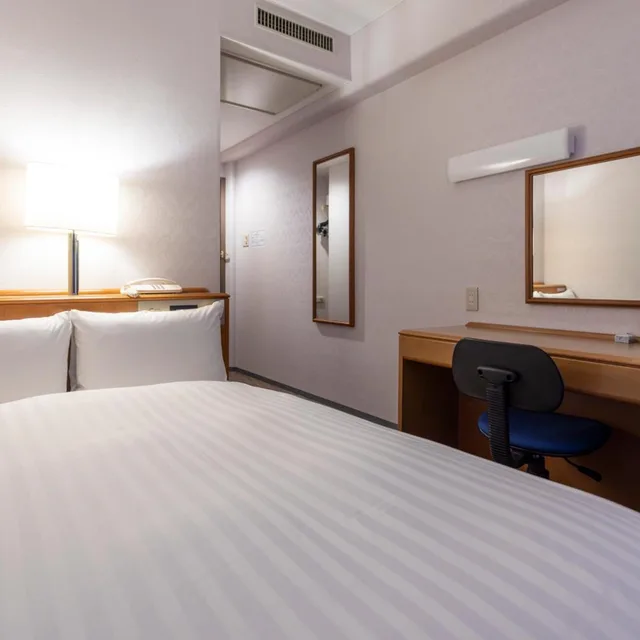 غرفة بسرير نصف مزدوج بحمام خاص للمدخنين، Hotel New Saitama 1/4