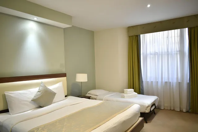 غرفة قياسية ثلاثية بسرير مزدوج وسرير فردي، Hyde Park Boutique Hotel 1/1