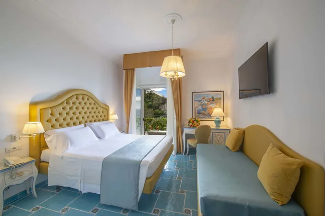 غرفة ديلوكس ثلاثية بسرير كينج، Hotel Pellegrino 2/4