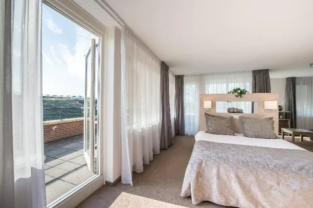 شقة فاخرة بسرير مزدوج بشرفة بغرفتين، Fletcher Wellness Hotel Kamperduinen 1/1