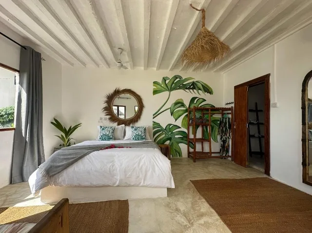 غرفة ديلوكس بسرير مزدوج مع سرير إضافي، Garden Beach Bungalows 1/10