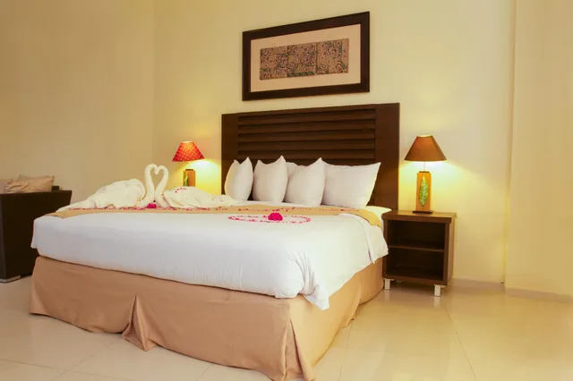 غرفة قياسية بسرير كينج وسرير كوين، Bahamas Hotel And Resort 1/2