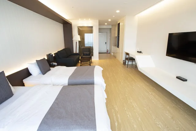 غرفة ديلوكس بسريرين منفصلين، The Qube Resort Jeju 1/2