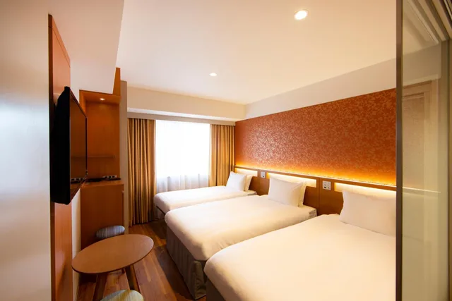 غرفة قياسية بسريرين منفصلين مع سرير إضافي، Karaksa Hotel Grande Shin-Osaka Tower 3/3