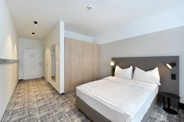غرفة قياسية بسريرين منفصلين لذوي الإعاقة، Wyndham Garden Munich Messe 2/9