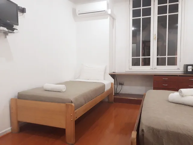 غرفة كلاسيكية ثلاثية بسرير كوين وسرير فردي بغرفة نوم واحدة، Tremo Parque Bustamante 3/8