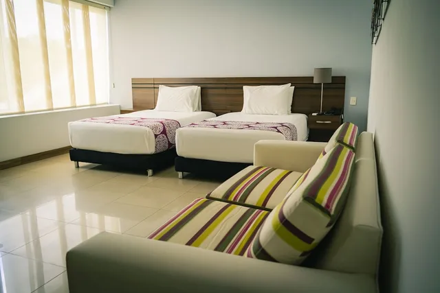 غرفة قياسية بسريرين منفصلين وسرير كوين، Malik Hotel Boutique 2/10