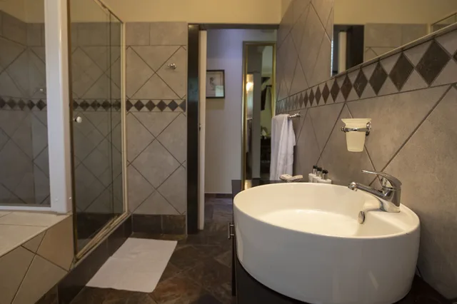 غرفة ديلوكس بسرير كينج، At Heritage House 3/4