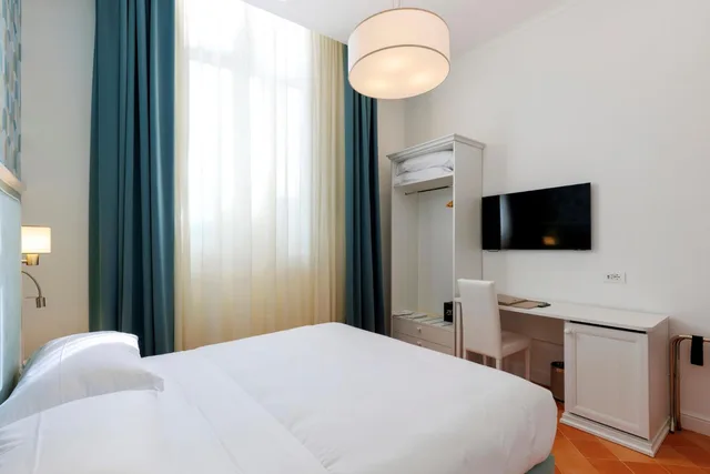 غرفة اقتصادية بسرير كوين، D'Amalfi Hospitality 1/6