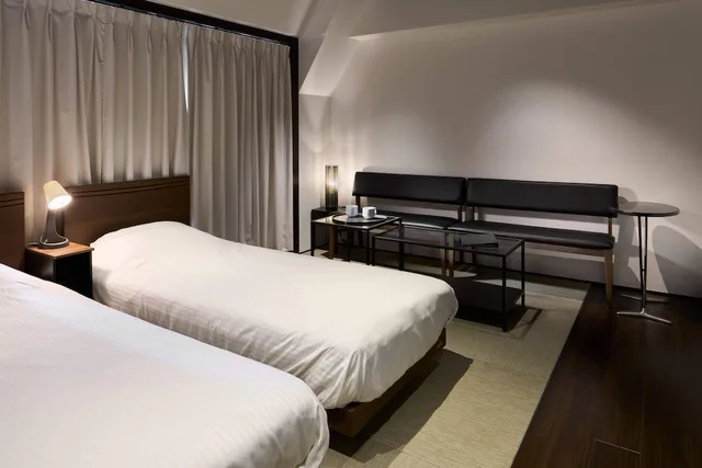 غرفة كومفورت بسرير مزدوج وسريرين منفصلين مع سرير سحّاب إضافي، Shinjuku City Hotel N U T S 4/6