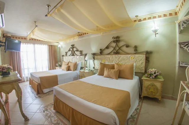 غرفة ثلاثية، Villa Las Margaritas Plaza Cristal Hotel 1/5
