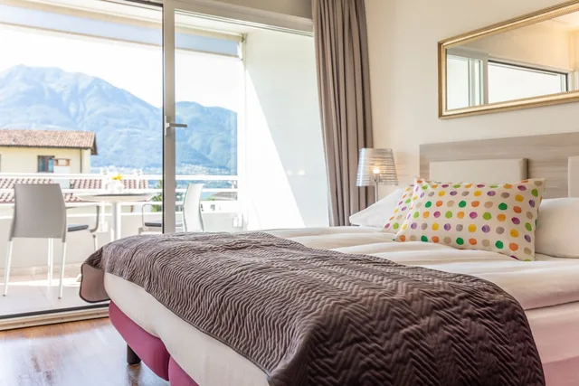 غرفة عائلية بسريرين كوين، Smart-HOTEL MINUSIO, a Swiss Quality Hotel 1/2