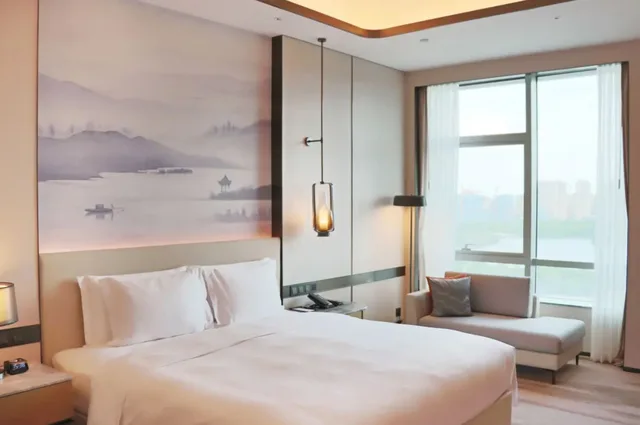 غرفة ديلوكس بسرير مزدوج بإطلالة على البحيرة، Pullman Suzhou Taicang 1/4