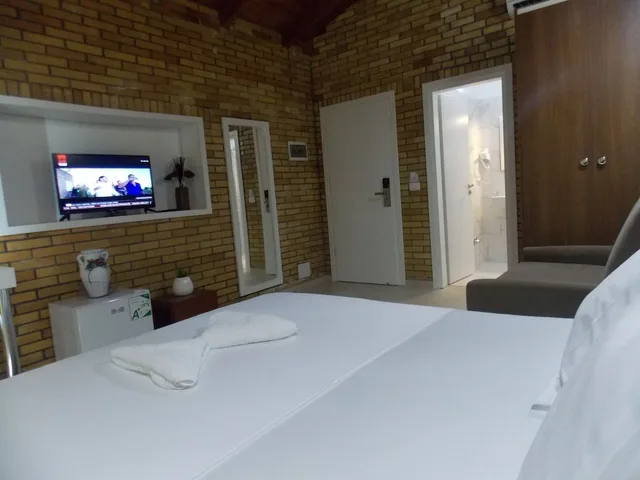 غرفة ديلوكس ثلاثية بسرير مزدوج وسريرين منفصلين بإطلالة على البحر، Hotel Piccollino 3/6