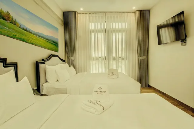 غرفة تنفيذية ثلاثية بسرير مزدوج وسرير فردي، Anvi Saigon Boutique Hotel 2/8