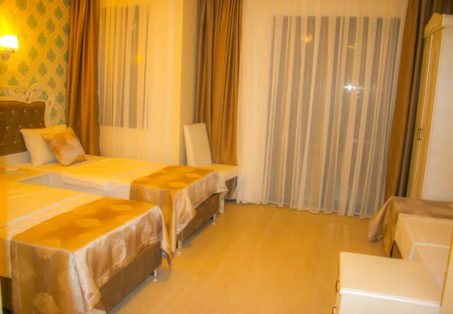 غرفة ديلوكس بسرير مزدوج أو سريرين منفصلين، Deluxe Newport Hotel 2/10