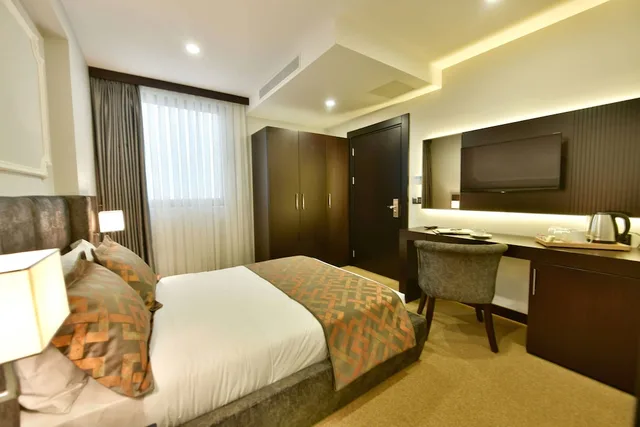 غرفة اقتصادية بسرير كوين، G-Han Hotel 3/6