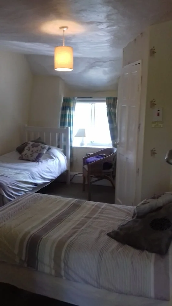 غرفة مفردة بسرير فردي بحمام مشترك، Southern Cross Guest House 1/1