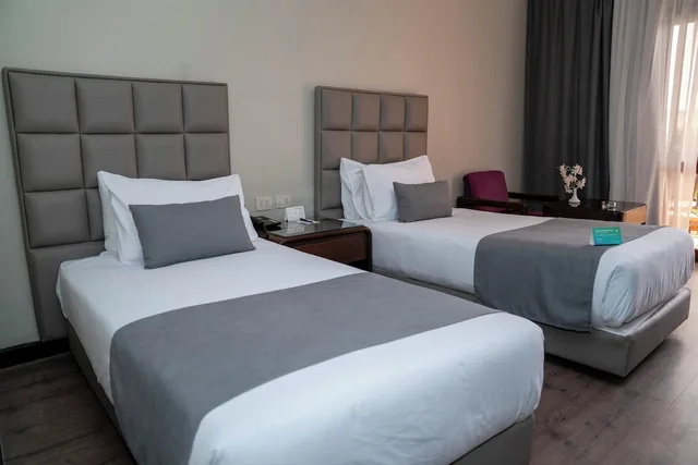 غرفة قياسية ثلاثية بسريرين منفصلين بإطلالة على الحديقة مع أريكة، Pyramisa Island Hotel Aswan 9/10