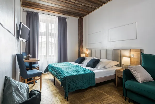 غرفة ديلوكس رباعية بسريرين منفصلين مع أريكة، Aparthotel Pergamin 1/7