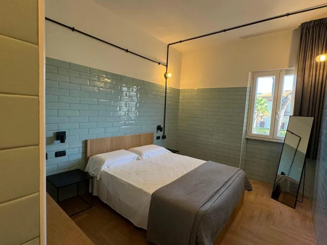 جناح جونيور بإطلالة على الحديقة، La Versiliana Hotel 2/7